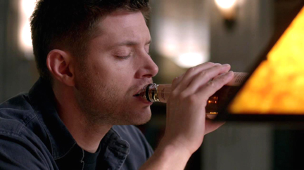 Dean's obviously trying to drink something away.